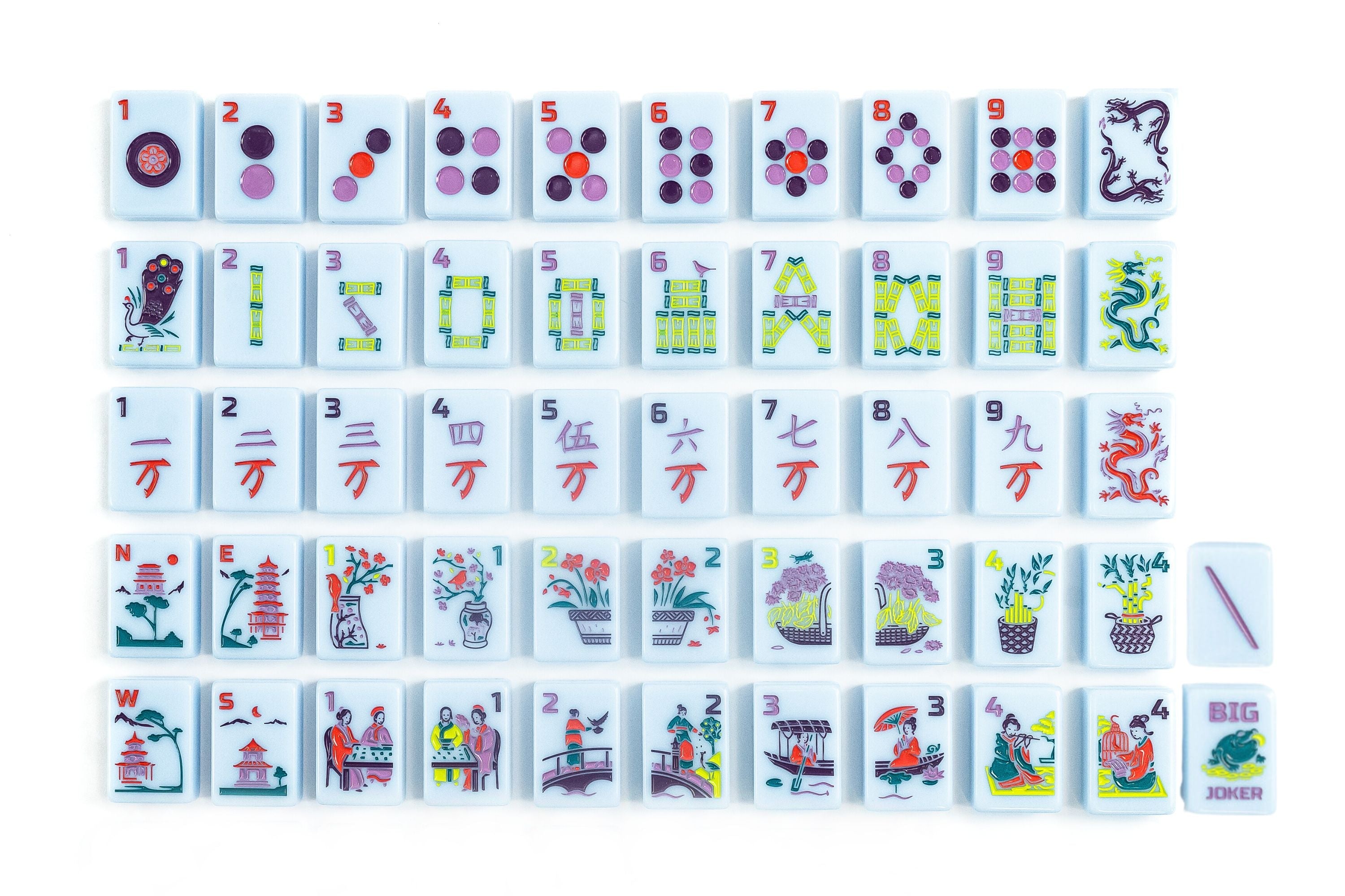 A mahjong set from The Mahjong Line with its tiles laid out in rows